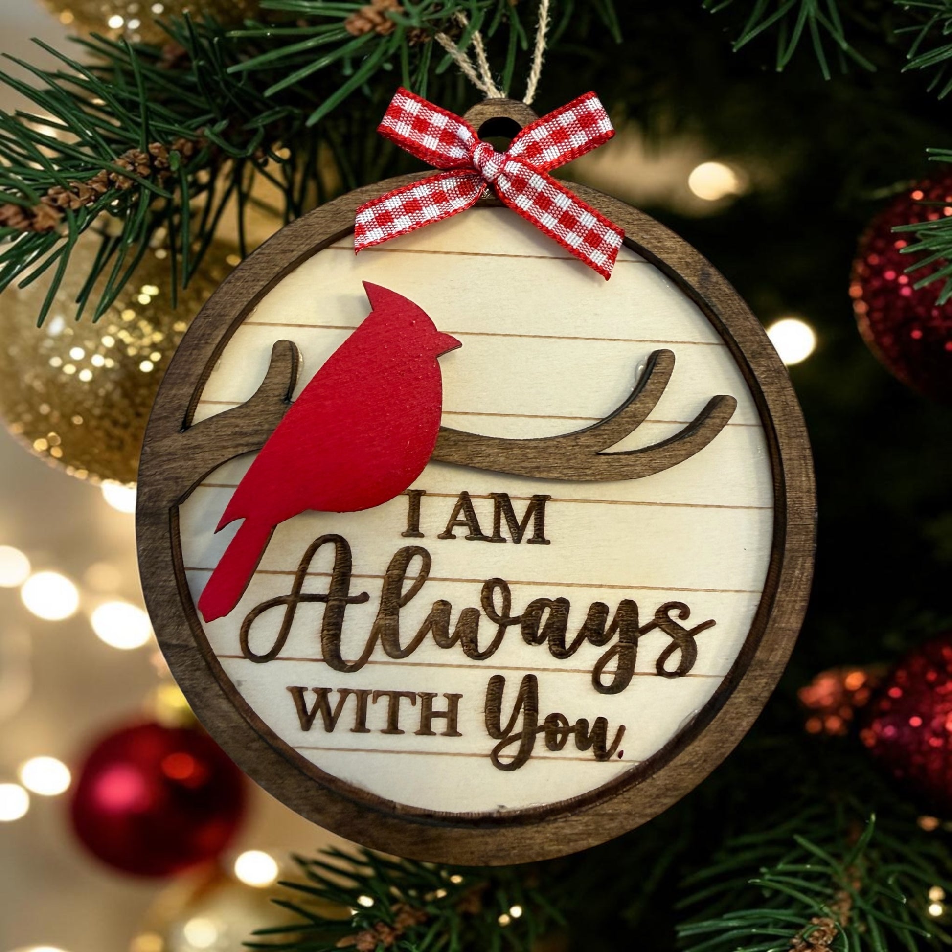Close-up of handcrafted wooden cardinal remembrance ornament